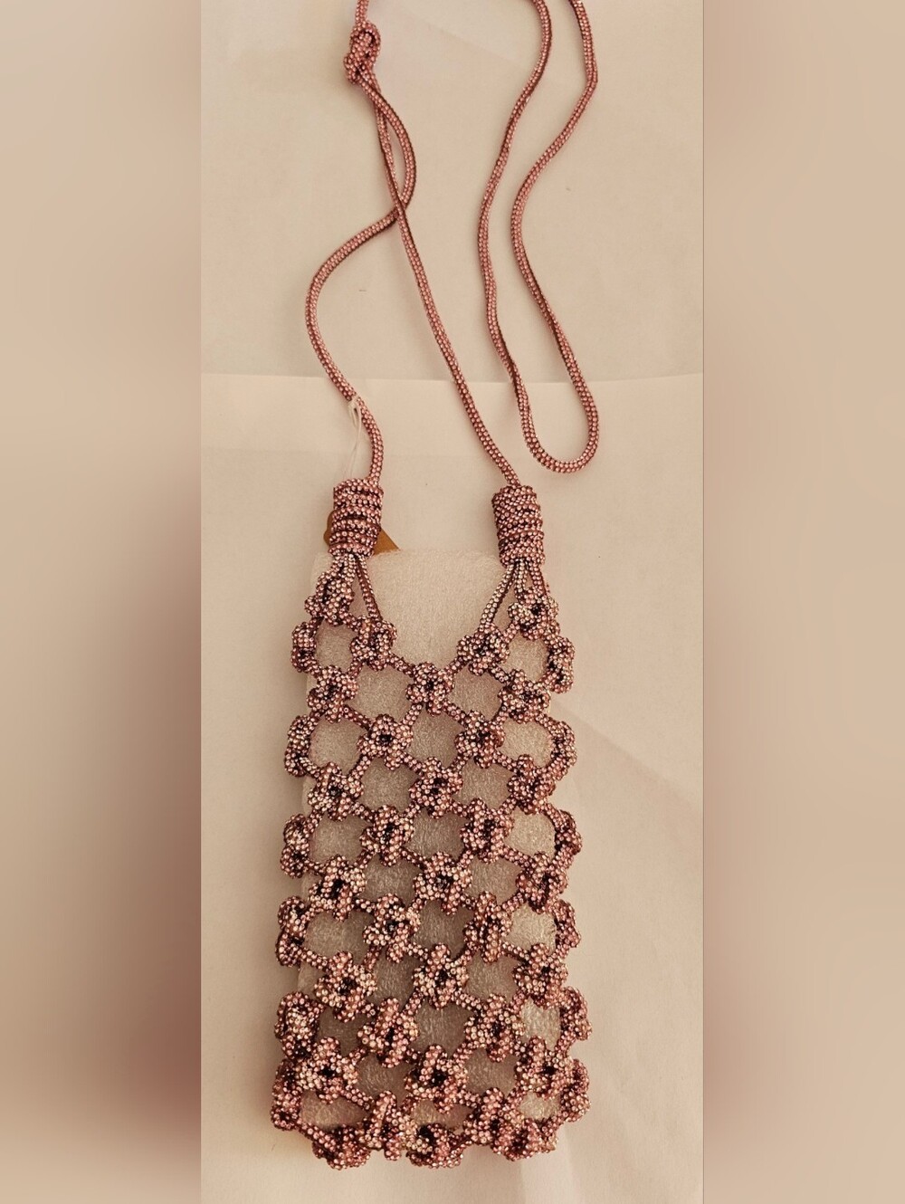  Ornate, handcrafted phone bag.